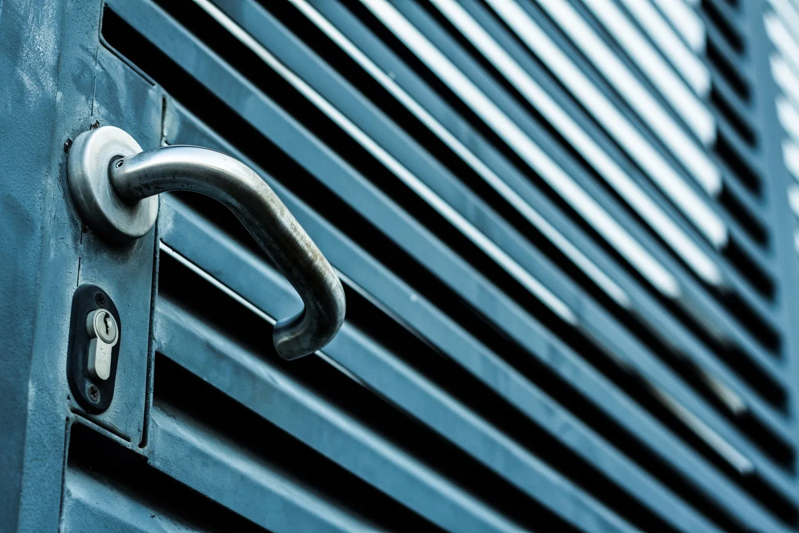 Detail of durable metal door hardware